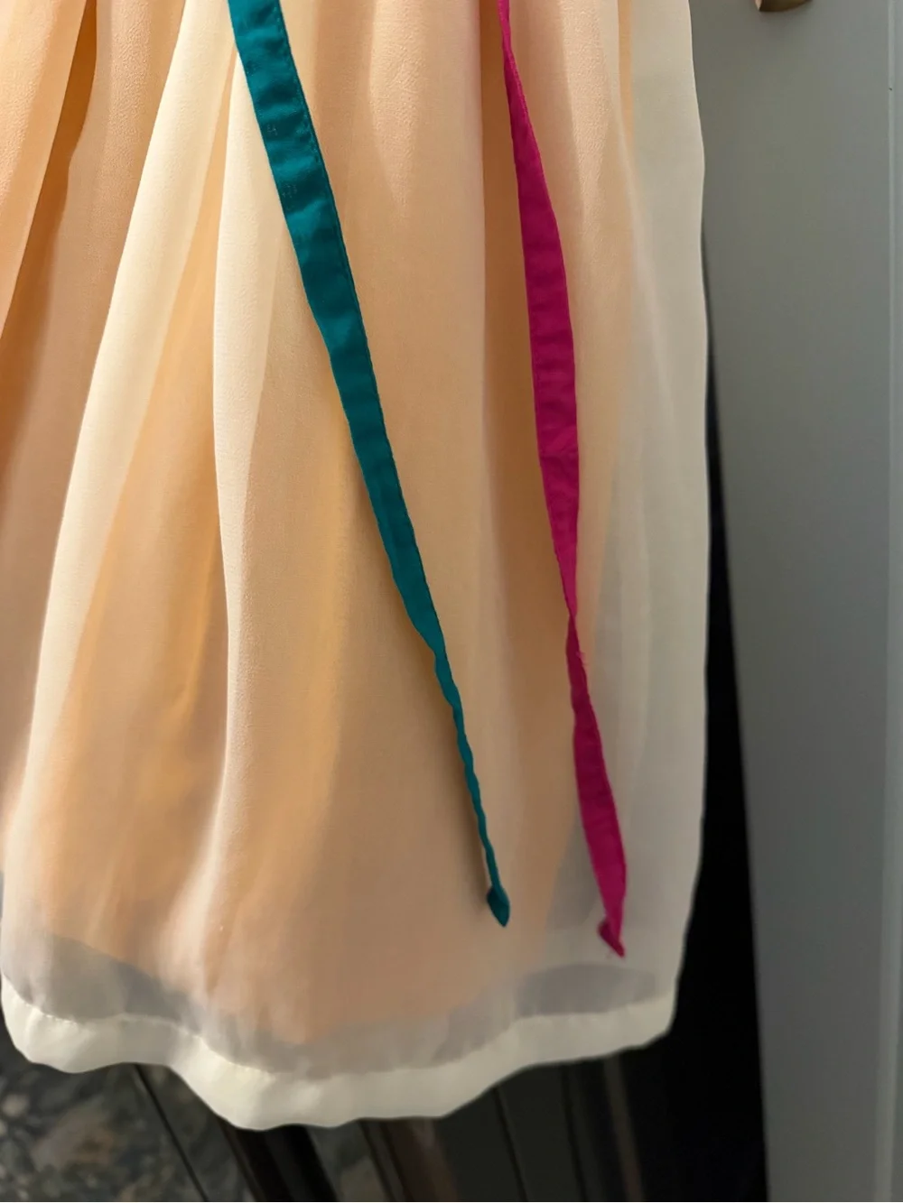 Well Dressed Wolf Cream Chiffon Dress with Pink Straps and Teal & Orange Ribbons